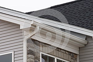 white plastic rain guttering system guttering drainage pipe exterior background of sandwich panel