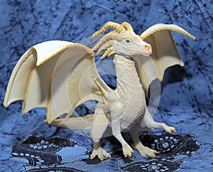 White plastic toy dragon