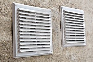 White plastic ventilation grille for internal air evacuation and