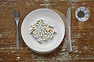 White plate filled with variety of pills