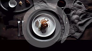 white plate with food, on a dark background.