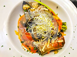 White plate with gourmet vegetarian dish meal in restaurant Mexico