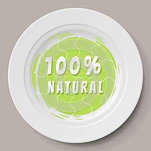 White plate with organic food logo. Cooking organic food with natural ingredients concept