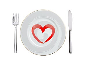 White plate with paint red heart symbol, spoon and fork isolated