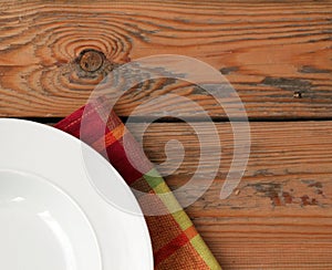 White plate with tissued napkin