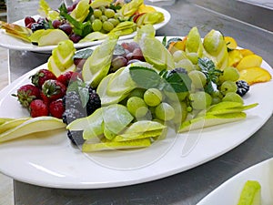 White plate with a variety of fruits