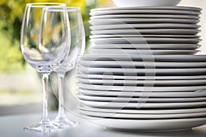 White plates and wine glasses