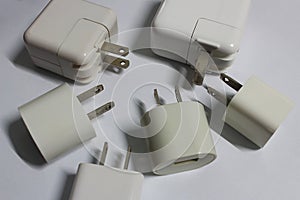 White plugs for charging smartphones