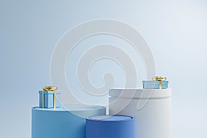 White podium with blue gift boxes and gold ribbon on blue studio