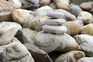 White poise stones on stone background