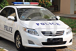 A white police patrol car