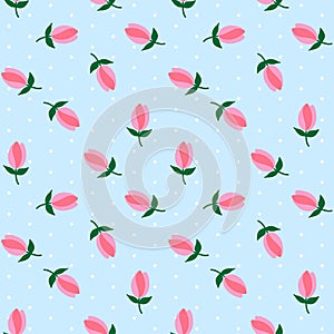 White polka dots on light blue background flower pink tulips sea