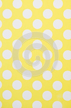 White Polka Dots on Yellow wall