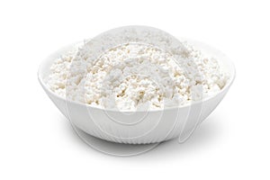 White porcelain  bowl with cottage cheese isolated on a white background