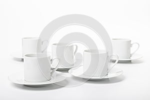 White porcelain cup and saucer for cappuccino and coffee isolated on a white background