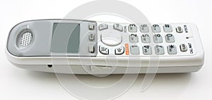 White portable home phone, horizontal