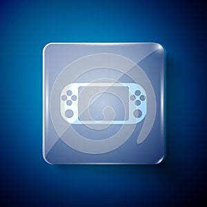 White Portable video game console icon isolated on blue background. Gamepad sign. Gaming concept. Square glass panels