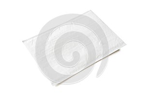 White postal package. Plastic parcel object background for online shopping advertising. Isolated on white background with clipping