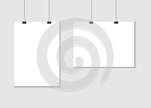 White poster hanging on binder. gray background with paper blank mockup.