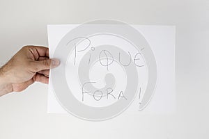 White poster with a message `PiquÃÂ© Fora` photo