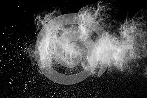 White powder explosion on black background.