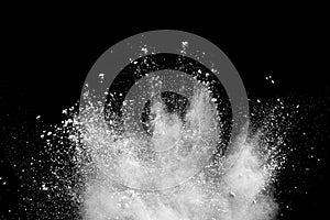 White powder explosion on black background.