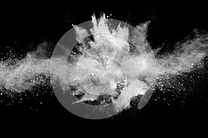 White powder explosion on black background.