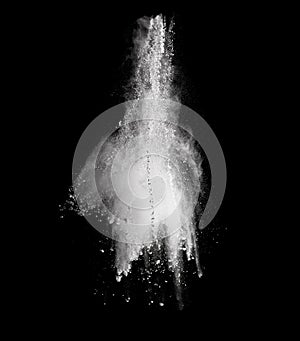 White powder explosion isolated on black background