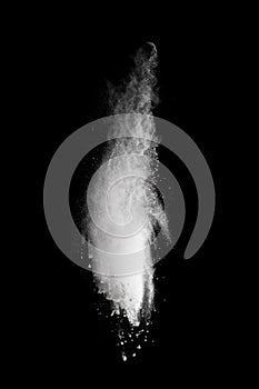 White powder explosion isolated on black background