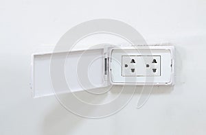 The white power outlet with cover to protect the electric shock