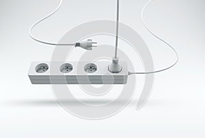 White Power Strip with Cords on a Studio Background. Minimal concept.