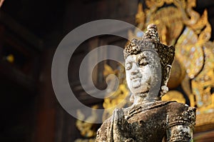 White praying Buddha statue