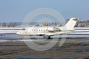 White private plane in a winter airport