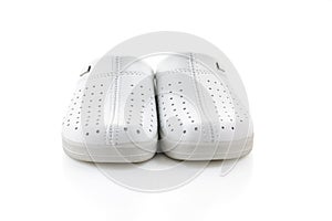 White professional ventilated work clogs. White hospital clogs. isolated on white background. Close-up