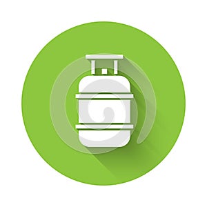 White Propane gas tank icon isolated with long shadow. Flammable gas tank icon. Green circle button. Vector