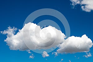 White puffy clouds on blue sky