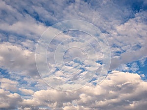 White, puffy clouds in blue sky