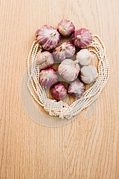 White and purple garlic and pearl threads