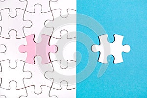 White puzzle with missing part