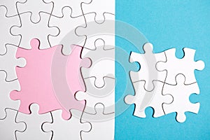 White puzzle with missing part
