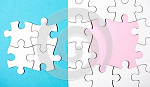 White puzzle with missing part