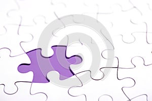 White puzzle with missing part