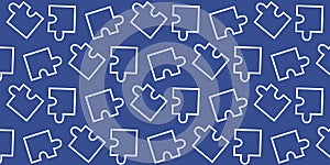 Puzzle pieces create a colorful pattern on a blue background for creative inspiration