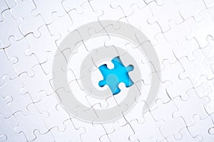 White Puzzle pieces with one piece removed, blue color