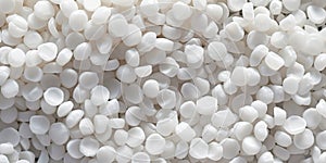 White PVC granulate background, recycled plastic granules, biodegradable plastic. Granules of eco-friendly plastic raw