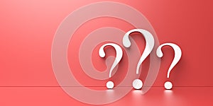 White question marks on red background with empty space on left side