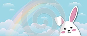 White rabbit with clouds and rainbow on blue sky background, Holiday illustration for greeting card of Easterâ€™s Day.