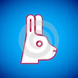 White Rabbit with ears icon isolated on blue background. Magic trick. Mystery entertainment concept. Vector