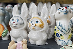 White rabbit figurines in Easter fair store