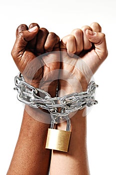 White race hand chain locked together with black ethnicity woman multiracial understanding